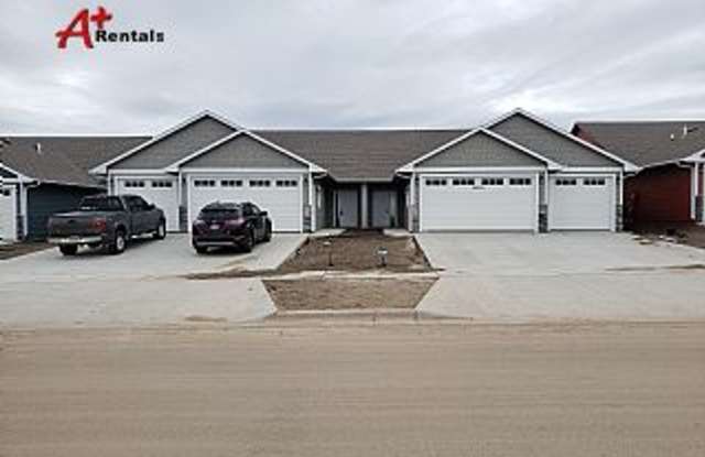 Three bedroom two bathroom Twin home w/ triple garage photos photos