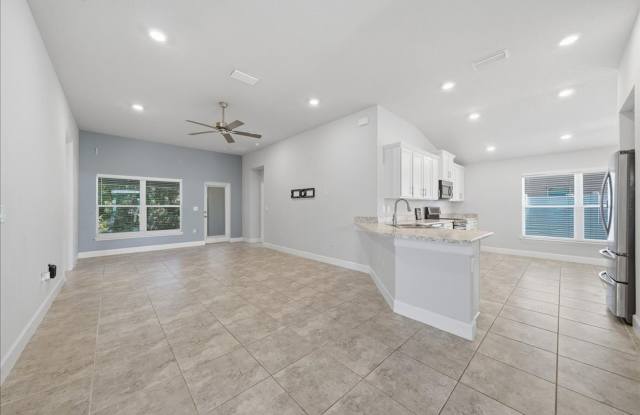 Spacious Cocoa Rental with Covered Lanai & Two-Car Garage near KSC and Port Gallery 4