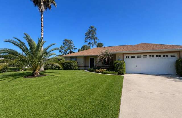 Discover this well-located 3-bedroom, 2-bath home in Palm Coast! photos photos
