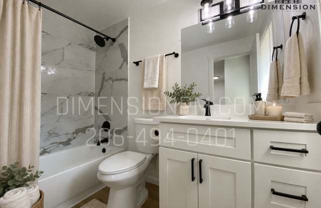 Nice, refreshed duplex with fireplace and W&D hook ups in Edgewood! Available NOW! Gallery 3