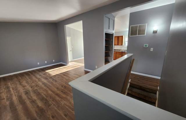 Updated 4BR, 1.5BTH ranch style home with garage and walkout finished basement. Gallery 3