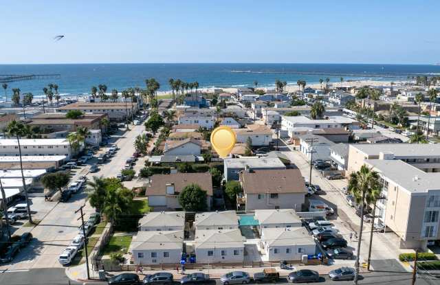 Coastal Living at Its Best – Renovated 2 Bed Just Steps from OB Pier! photos photos