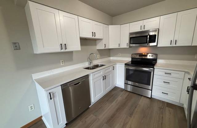 Quiet Neighborhood Gem: Updated 3BR Townhome with Garage  Yard - 3002 18th Street South, Fargo, ND 58103