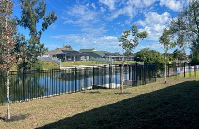 Brand-New Canal Front Home with Private Dock, 3-Car Garage & Modern Upgrades in Cape Coral Gallery 3