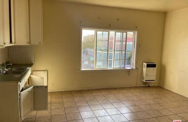 1005 W 46TH Ave unit: 4 photos photos