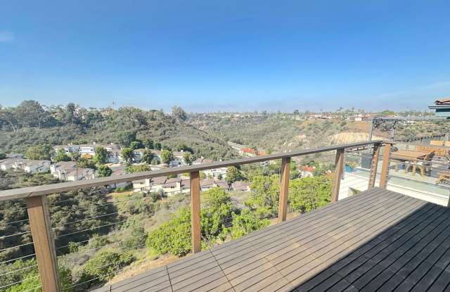 Stunning Hillside Home with Expansive Views and Modern Comforts photos photos
