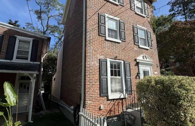 Stately Updated Three- Story Brick Colonial Now Available for Rent Gallery 1