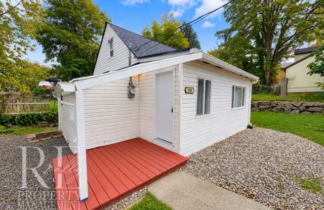 Charming Bloomington Ave Home | Spiral Staircase, Expansive Yard & Updated Interiors! Gallery 1