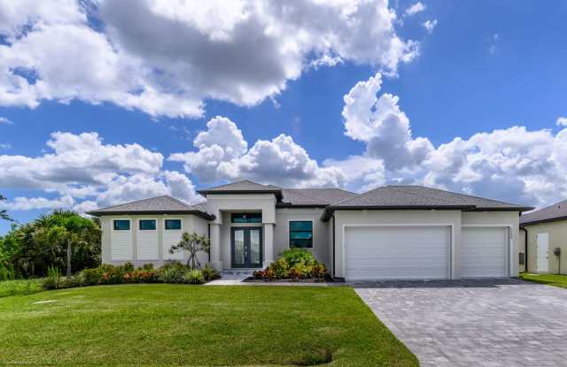 BRAND NEW- READY TO MOVE-IN LUXURY HOME IN SOUTH GULF COVE photos photos