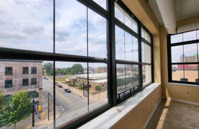 Downtown Luxury Condo in a Newly Renovated Building. High Rise Views of the City photos photos