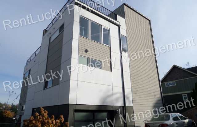 Fantastic 3 Bedroom Townhome w/Attached Garage and A/C in Seattle!! photos photos