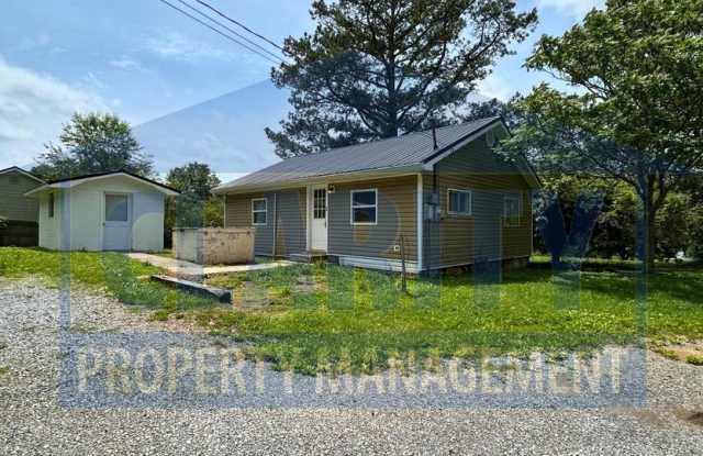 Charming 2-Bedroom Home with Spacious Yard and Extra Storage! photos photos