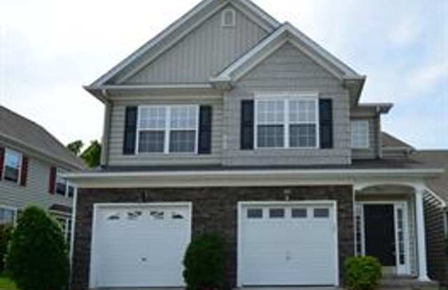 ONE LEVEL LIVING AT IT'S FINEST! LOTS OF GREEN SPACE IN A WELL PLANNED CONDO COMMUNITY IN SUFFOLK photos photos