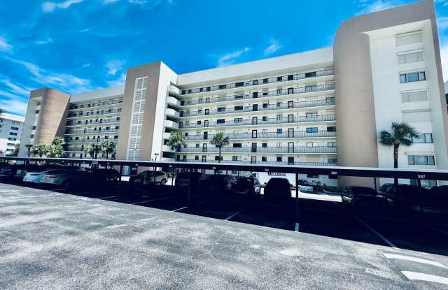 BEAUTIFULLY UPDATED RIVERFRONT CONDO WITH SPECTACULAR ROCKET LAUNCH VIEWS Gallery 1
