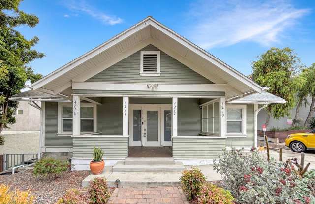 Charming 2BD/1BA Condo in University Heights W/ Detached Garage, Shared Backyard  Laundry Room! photos photos