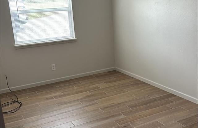 Charming 3-Bedroom Brick Home with Modern Upgrades  Spacious Backyard! photos photos