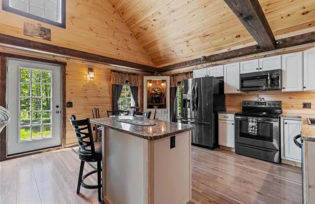 Gorgeous Custom Rustic Style home with heat included! Gallery 1