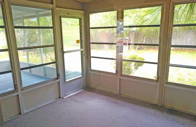 Spacious 2/2 home featuring neutral ceramic tile throughout within the heart of Spring Hill Gallery 4