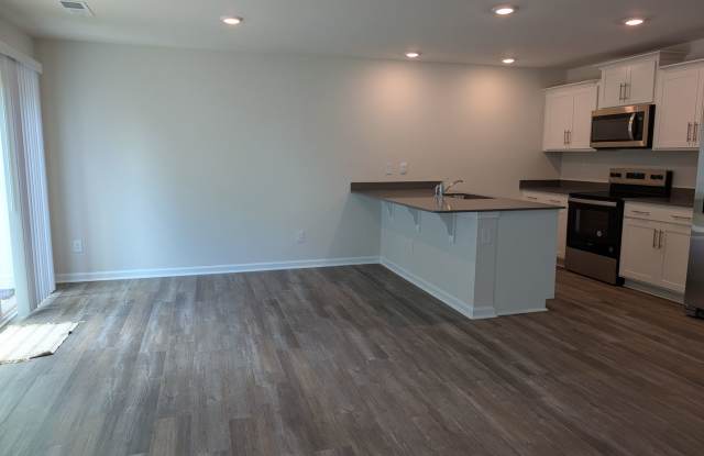 ***50% off the first full month of rent*** Beautiful 4 Bedroom, 2.5 Bathroom Townhome in Mallard Creek! Gallery 4