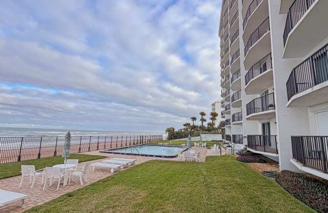 Spectacular Ocean front ground floor unit , just steps away from water and sand photos photos