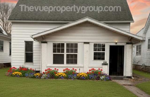 Charming Three-Bedroom with Garage  Fenced Yard photos photos