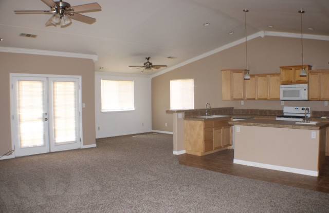 Charming 3-Bedroom Home with Fireplace, Spacious Backyard & Attached Garage in California City! Gallery 3