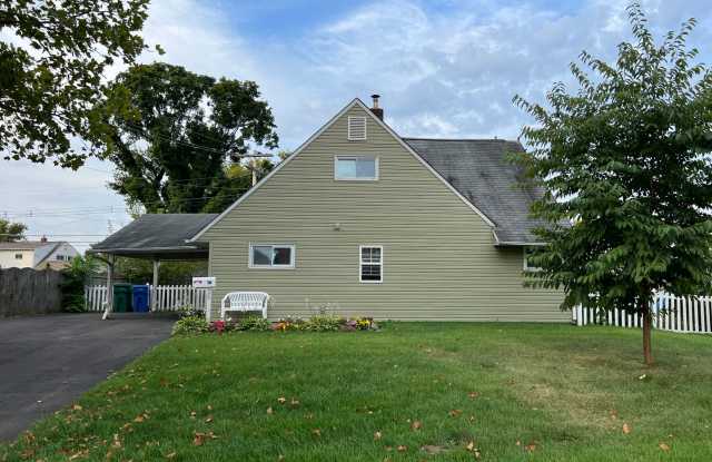 Welcome to this 4 bedroom 2 bath home in the Crabtree section of Levittown. photos photos