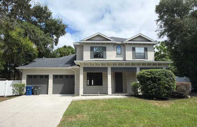 Exquisite 4-Bed, 5.5-Bath Executive Retreat with Lap Pool in Prime Winter Park Location Gallery 1