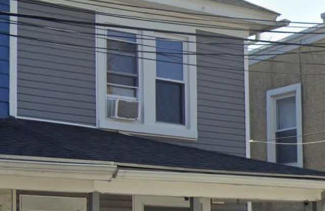 Twin home with updated kitchen, washer/dry on first floor, private back yard and porch. photos photos