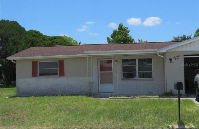 7040 POTOMAC DRIVE - 7040 Potomac Drive, Jasmine Estates, FL 34668