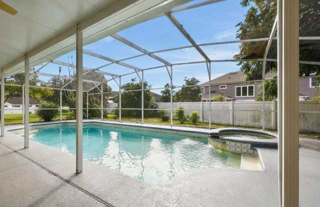 Spacious 4/4 Home in Oviedo FL!  Private Covered Pool! Convenient Location Near Shopping, Dining & SR 417! Gallery 3