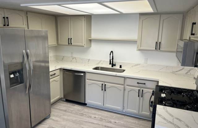 Experience easy living in this bright and open condo! photos photos