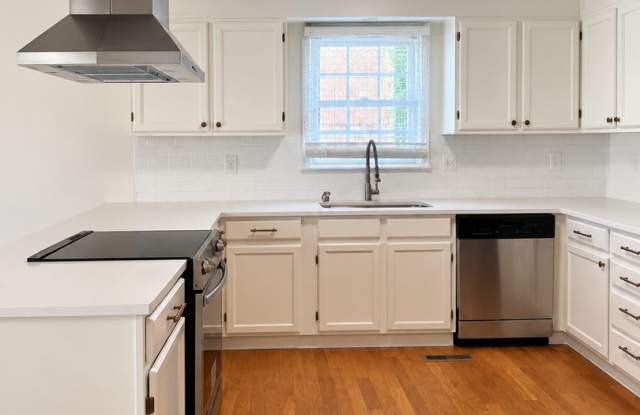 Charming 2 Bed Brick Home with Updated Kitchen, Hardwood Floors & Spacious Backyard Gallery 1