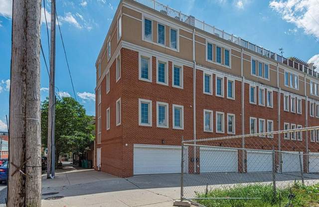 Beautiful EOG 3 bedroom 2.5 bath townhome with a 2 car garage and roof top deck overlooking the water and city. photos photos