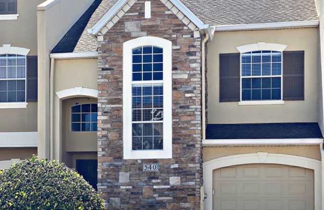Move in September! Stunning 4 bedroom + Loft, 2.5 bath Townhome Gated community in Avalon Park. 1 car attached garage. HOA handles lawn care. Primary bedroom on 1st floor. photos photos