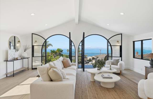 Completely Remodeled, Custom 4BR3.5BA Hilltop Home w/ Incredible Panoramic Ocean/Whitewater/Coastline Views, Open Top Floor Living Space w/ Large Balcony, Beautifully Landscaped Outdoor Space for Indoor/Outdoor Living & Large Driveway + 2-Car Garage! photos photos