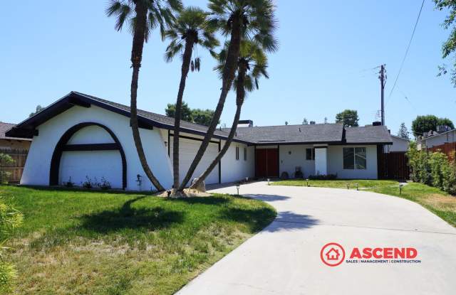 Spacious 4BR/2BA Bakersfield Home with Fireplace photos photos