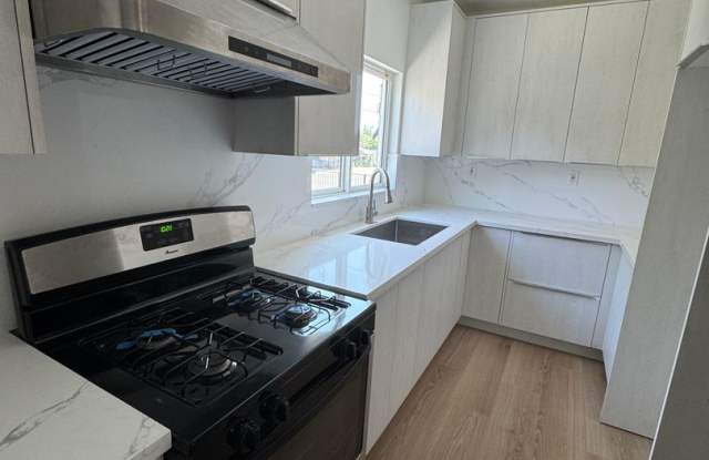 Newly Renovated 3 Bed, 3 Bath Ground Floor Unit in the Heart of Pomona; Modern, Efficient, and Move In Ready photos photos