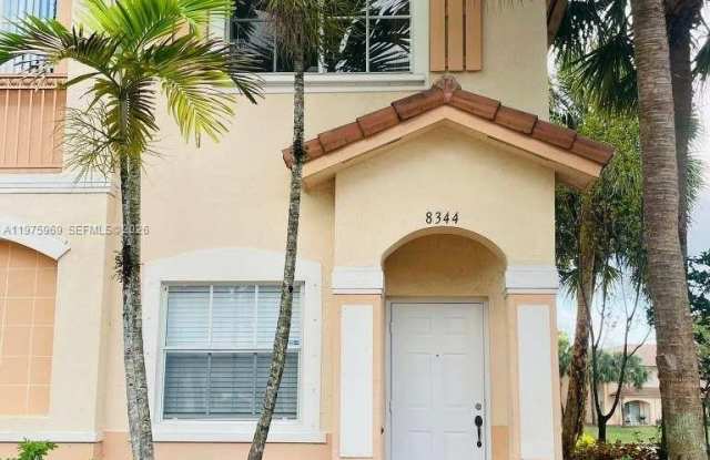 8344 SW 27 photos photos