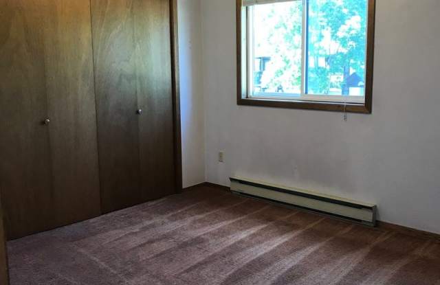 Charming 2-Bedroom Condo Near MSU – Pet Friendly- NEW LOW PRICE photos photos