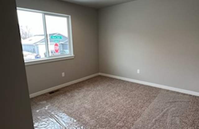 3 bed/2 bath rambler style home! Attached garage, fenced back yard & A/C! Gallery 4