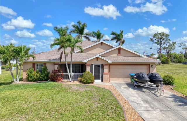 Live in Style in Cape Coral’s Desirable Burnt Store District! photos photos