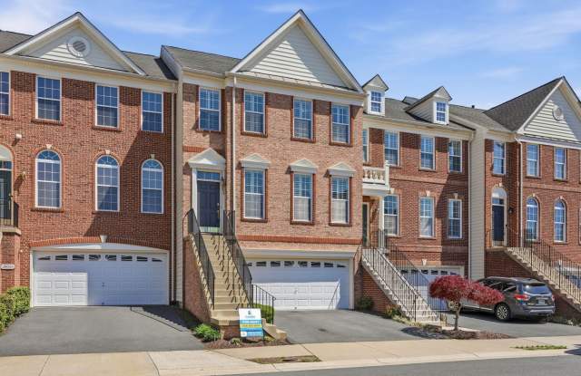 Indulge in the charm and elegance of this beautifully enhanced townhome, thoughtfully expanded across three spacious levels in Ashburn. photos photos