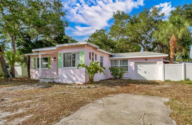 Charming Dunedin Retreat: 2BR Home with Sunroom  Garage! photos photos