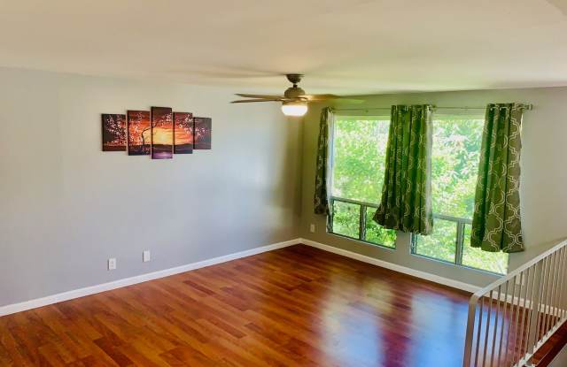 Spacious upstairs unit. Large Living area. Parking Available photos photos