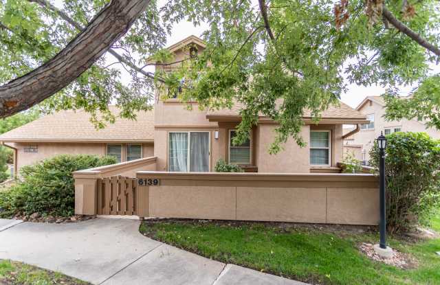 Impeccably Maintained End Unit Townhome with 2-Car Garage: Effortless Comfort & Convenience Await! photos photos