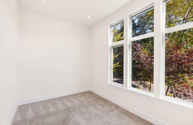 Modern Corner Home with Abundant Natural Light, Spacious Balcony & 2-Car Garage! Gallery 3
