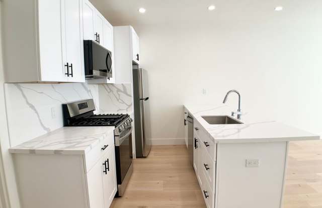 REMODELED 1/1.  In-Unit W/D!  Dishwasher! Roof Deck! Great Light! Gallery 3