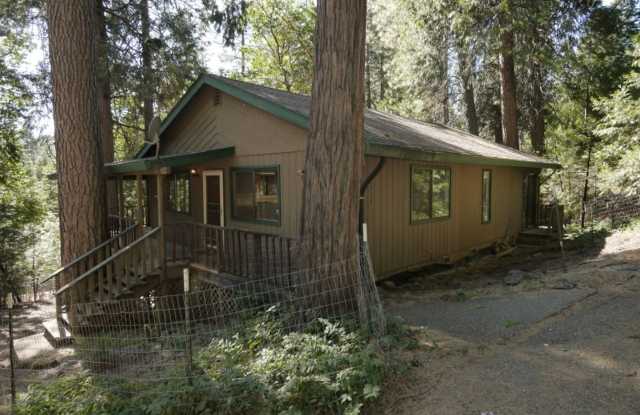 Two story home with large covered back deck at 27252 Cedar Bow Ct. in Pioneer. photos photos