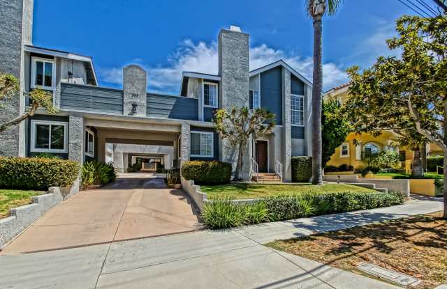Remodeled, Bright & Airy, 2-Story Front Townhouse w/ Dual Primary Suite Layout, Bright & Open Living Space w/ Ocean Peek & 2-Car Garage Close to Schools, Shopping & Just 2 Mins to Beach! Gallery 1
